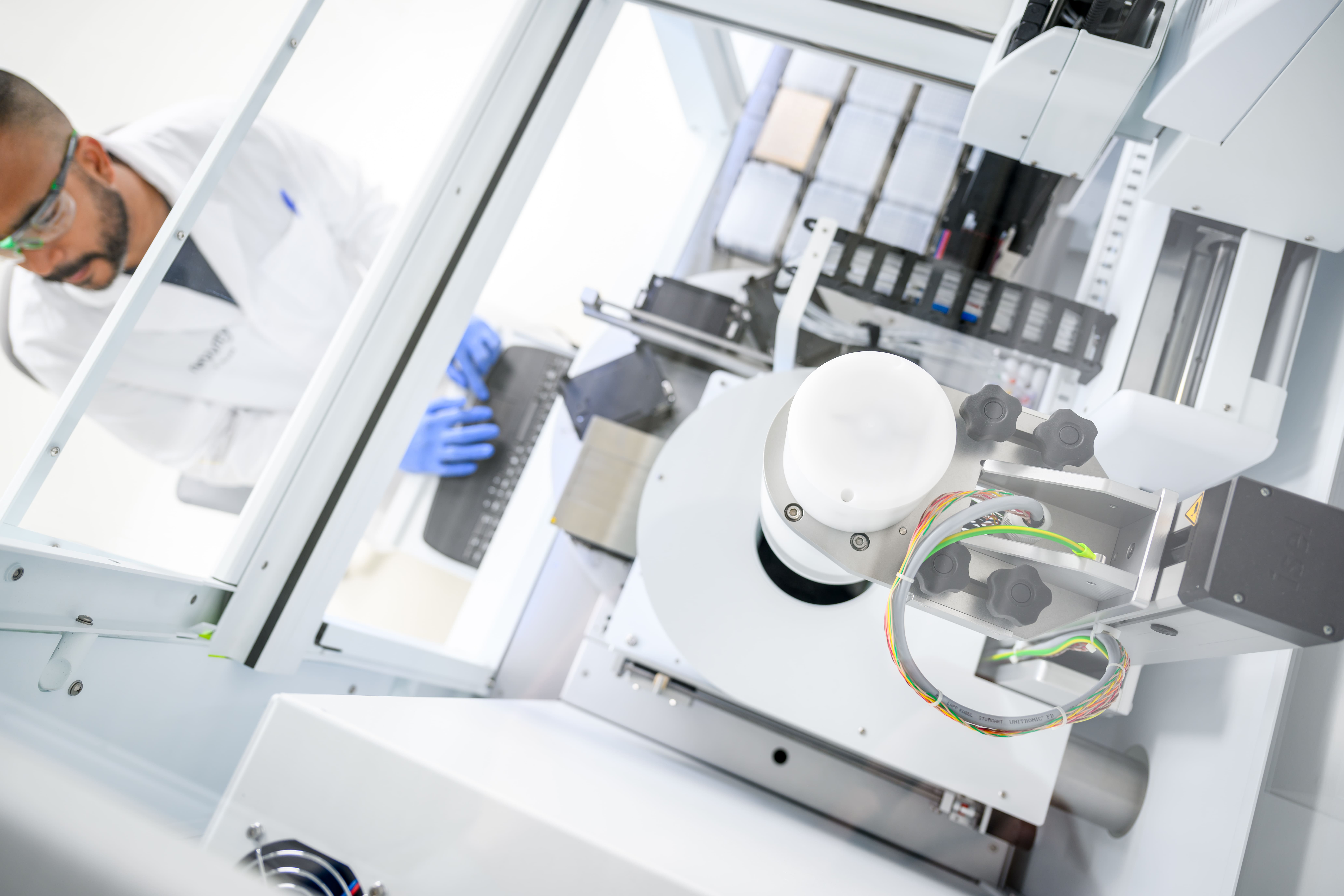 Researcher working on chemagic prime instrument